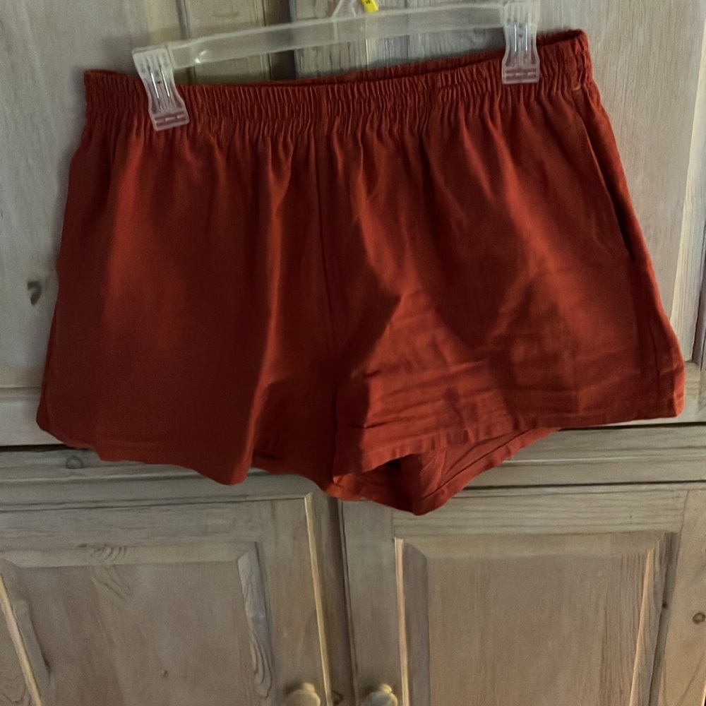 NWT Rust color elastic waist shorts.